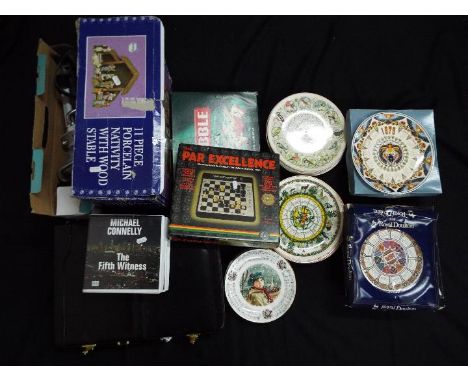 Lot to include collector plates, boxed musical nativity scene Christmas decoration, boxed electronic chess game and similar. 