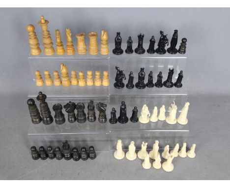 Two chess sets to include a St George pattern example with 10 cm king and one other. 