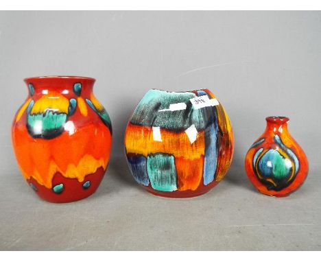 Poole Pottery -  Three 'Delphis' series vases, largest approximately 20 cm (h). [3]Condition Report: Pieces appear in good co
