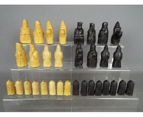 A 'Lewis Chessmen' chess set, 8.5 cm king.