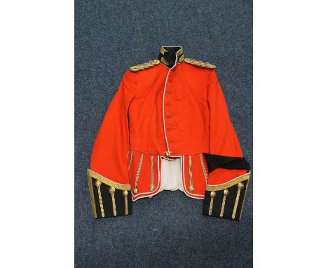 British army red coatee with bullion wire collar and Royal Scots buttons, bullion wire epaulettes with three stars and the le