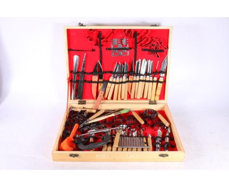 Chinese made Vogue garnishing eighty piece carving tool set in original box. 