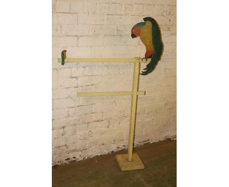 Vintage painted two bar towel rail with parakeet design, 137cm high. 