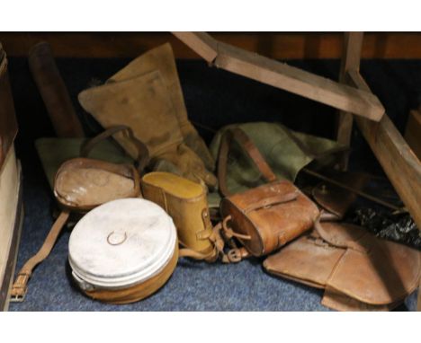Two leather binocular cases, a leather holster, a leather sword case, gauntlets, etc. 