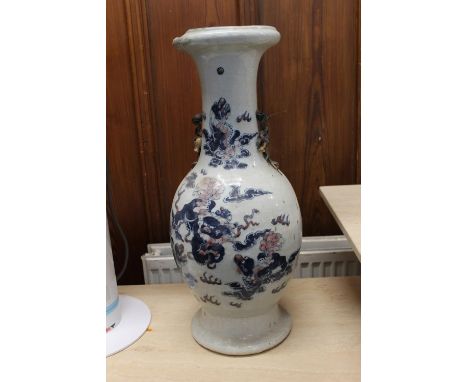 Large Chinese ceramic baluster vase, decorated with dragons and relief fruiting pomegranate branches, four character mark to 