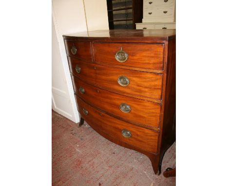 Victorian mahogany bow front chest with two short frieze drawers over three long graduated drawers, raised on splay bracket f