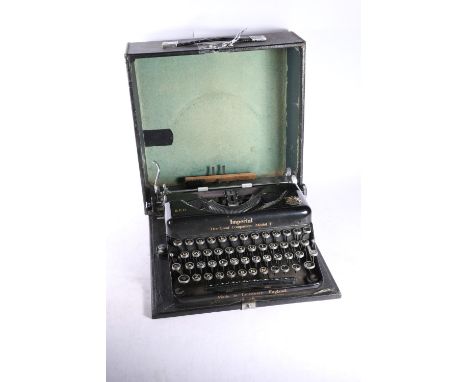 Imperial EER Model T typewriter in original carrying case. 
