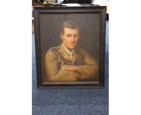 20TH CENTURY SCHOOL Half length portrait of an army officer Oil painting on canvas, signed indistinctly upper left, 59cm x 49