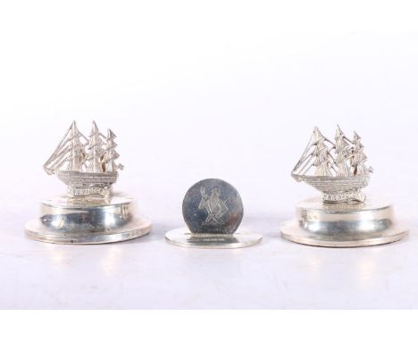 Pair of silver menu holder stands with HMS Victory surmounts by Levi & Salaman, London 1901 and another by Hamilton and Inche