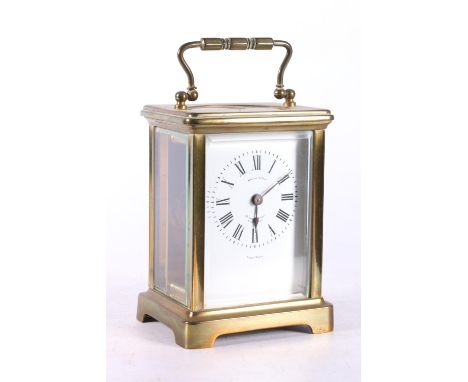 French brass carriage clock with white enamel dial with Roman numeral chapter ring, retailed by Brook and Son of Edinburgh, 1