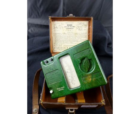 Megger Ohmmeter, green Bakelite case with leather outer case