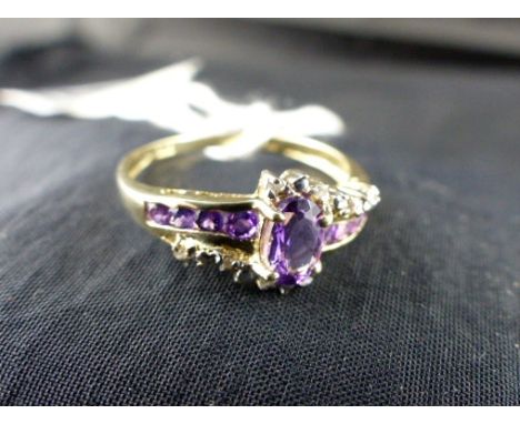 9 ct gold amethyst &diamond ring.