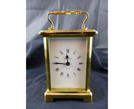 Bevelled glass panel and brass Bayard 8 day mechanical movement carriage clock. H: 12 cm