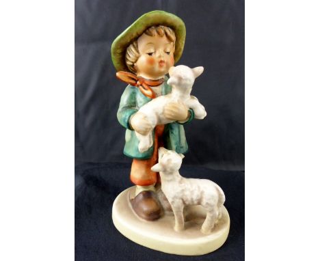 Goebel Hummel figurine of a boy with two lambs, impressed 643B. H: 13 cm