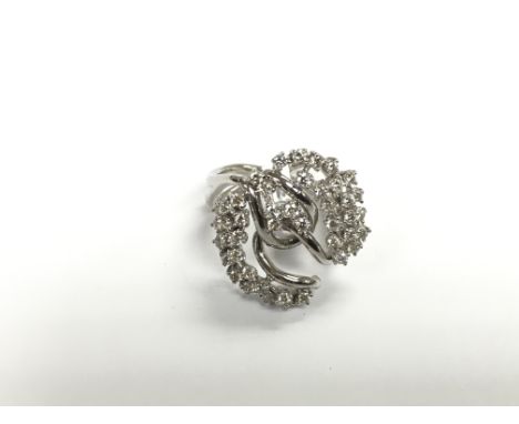 An 18ct white gold multi diamond set cluster ring, approx 10g and approx size Q-R.