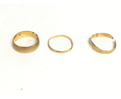 Three 22ct gold wedding bands. Total weight 6.20g
