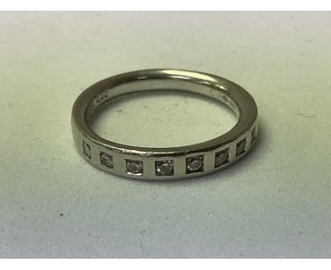 A platinum .950 and diamond, approx 0.20ct half eternity ring.