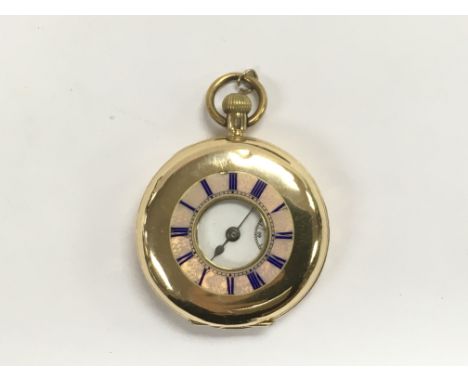 An 18ct gold cased half hunter button wind pocket watch.