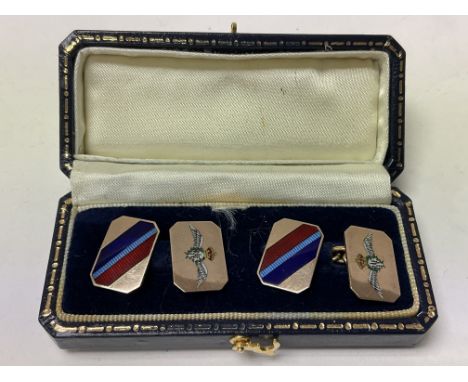 A pair of 9ct gold and enamel RAF cufflinks.