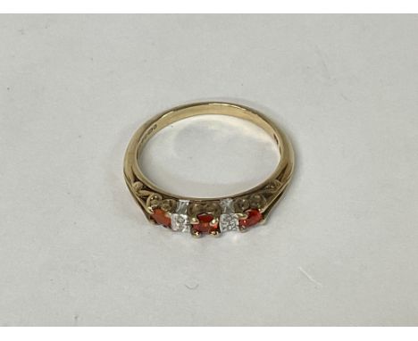 A 9ct Gold ring with a row of gemstones, 2.1g P.5