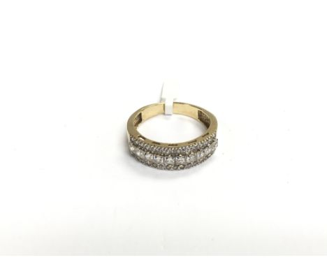 A gold half hoop ring set with clear stones, approx 5g and approx size U.