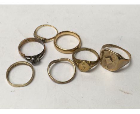 A collection of seven gold rings including gold total weight 18 grams.