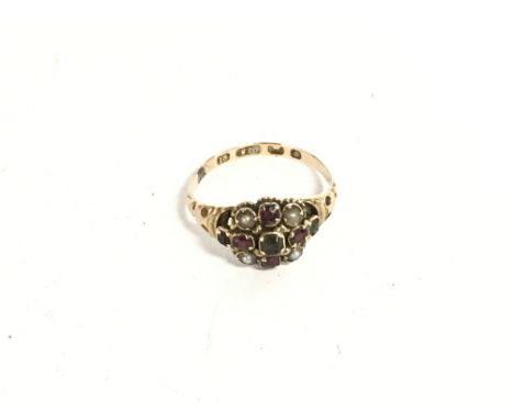 15ct gold ring set with seed pearls and gem stones. Total weight 1.87g size L.