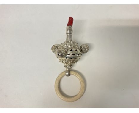 Hallmarked silver rattle with coral and bells