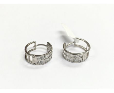 A pair of 9ct white gold stone set earrings, approx 2.4g.