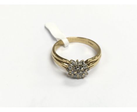 A multi stone set 9ct gold cluster ring, approx 2.7g and approx size O.