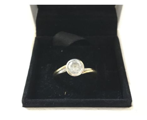 An 18ct gold diamond ring. Approximately 0.75 ct 5.85g and size O.