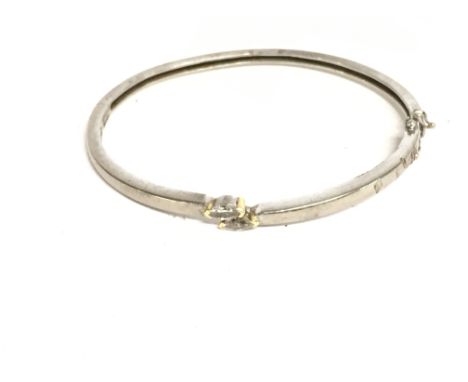 An 18ct white gold bracelet set with two diamonds. Damaged.