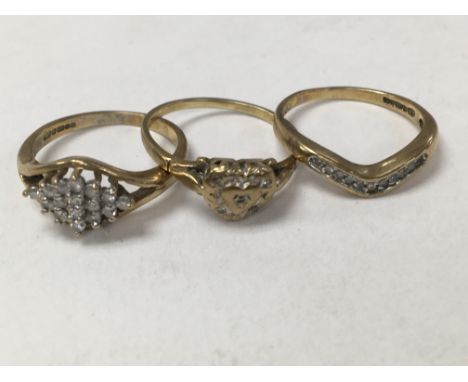 Three 9 ct gold rings. Total weight 5 grams.