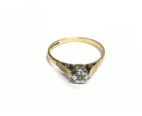 An 18ct gold ring set with a small diamond, approx 2.7g and approx size S-T.