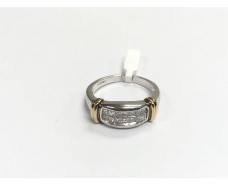 A 9ct white and yellow gold ring set with princess cut diamonds, approx 5.3g and approx size S-T.