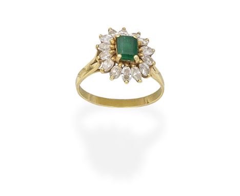 EMERALD AND DIAMOND CLUSTER RINGThe step-cut emerald within a marquise-cut diamond surround,  diamonds approx. 1.40cts total,