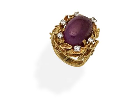 ALAN MARTIN GARD: RUBY AND DIAMOND RING, 1969Set with a ruby cabochon within an openwork 18 carat gold textured foliate mount