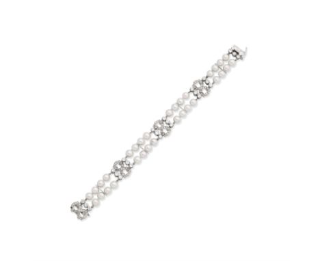 CULTURED PEARL AND DIAMOND BRACELETThe two strands of 6.5mm cultured pearls, interspersed with brilliant and single-cut diamo