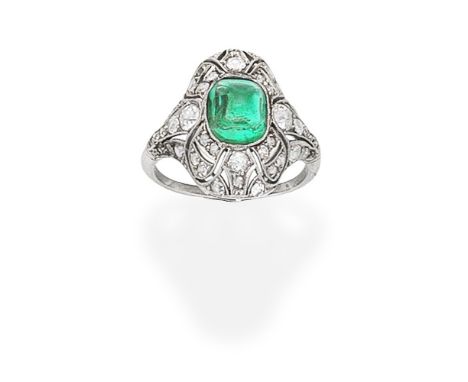 EMERALD AND DIAMOND RINGThe sugarloaf emerald within a pierced mount set with old brilliant, single and cushion-shaped diamon