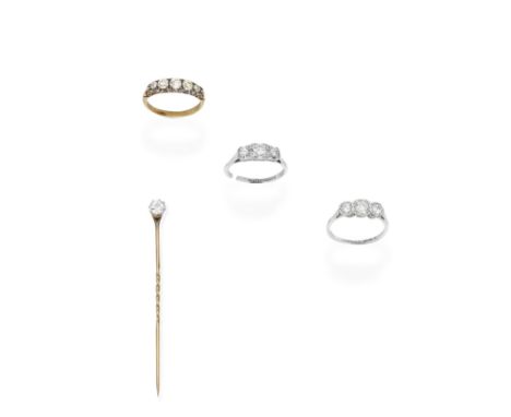 THREE DIAMOND RINGS; DIAMOND STICK PIN1st: Set with five graduated old brilliant-cut diamonds, 2nd: Set with three graduated 