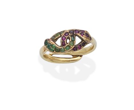EMERALD AND RUBY DOUBLE HEADED SNAKE RING, 19TH CENTURYDesigned as two snakes coiled in an eternal knot, set with step-cut em