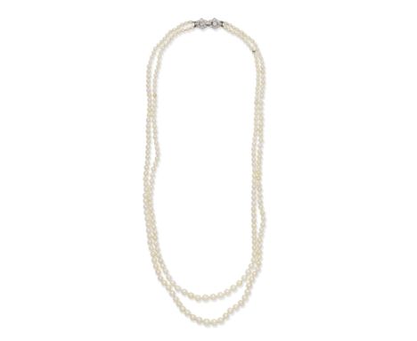 NATURAL PEARL NECKLACE WITH DIAMOND CLASPThe two rows of 2.8mm - 5.8mm natural pearls, and one cultured pearl, on a clasp set