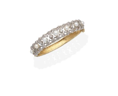 CULTURED PEARL AND DIAMOND BANGLEOf openwork design, set with 4.0-6.0mm cultured pearls, and brilliant and single-cut diamond