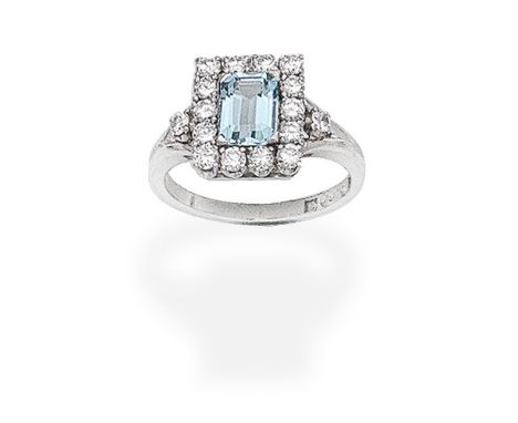 AQUAMARINE AND DIAMOND RINGThe rectangular step-cut aquamarine, within a brilliant-cut diamond surround and shoulders, Swedis