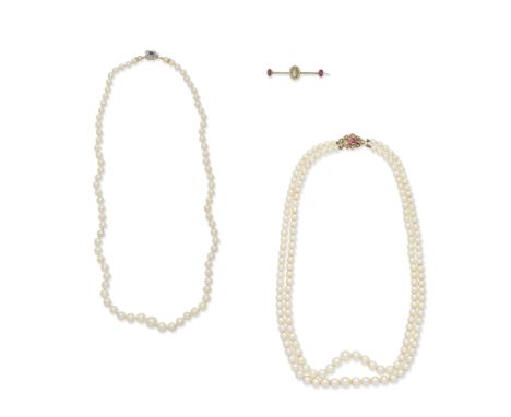 CAT'S EYE CHRYSOBERYL AND RUBY BAR BROOCH; TWO CULTURED PEARL NECKLACES WITH MULTI GEM-SET CLASPS1st: The cat's eye chrysober