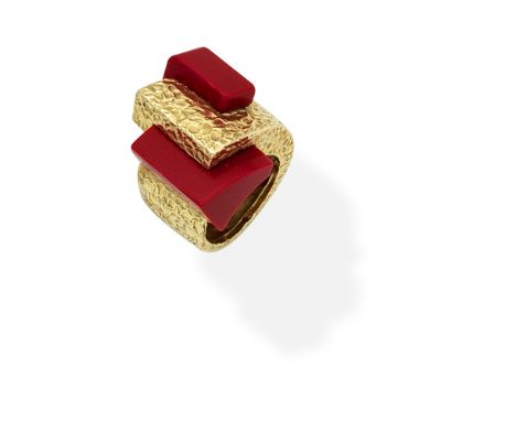 RED CERAMIC DRESS RING, CIRCA 1970Of geometric design, set with red ceramic sculptural forms within a textured mount, ring si