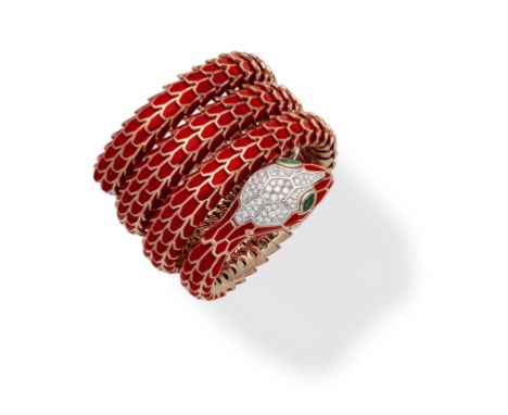 ENAMEL AND GEM-SET SNAKE BRACELET/WATCHDesigned as a coiled snake with sprung structure, decorated with red enamel, the head 