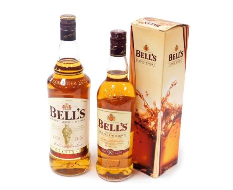 A Bells 1L bottle of Original Scotch whisky, together with a 70cl bottle of aged eight years whisky, boxed. (2) 