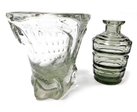 A mid century art glass vase, of swelling abstract form, with air bubble inclusions, 20cm high, together with a faceted grey 