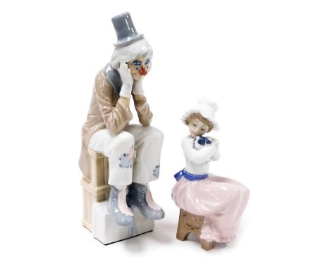 A Lladro porcelain figure of a Pierrot, modelled seated with his head in his hands, together with a Nao figure of a girl with